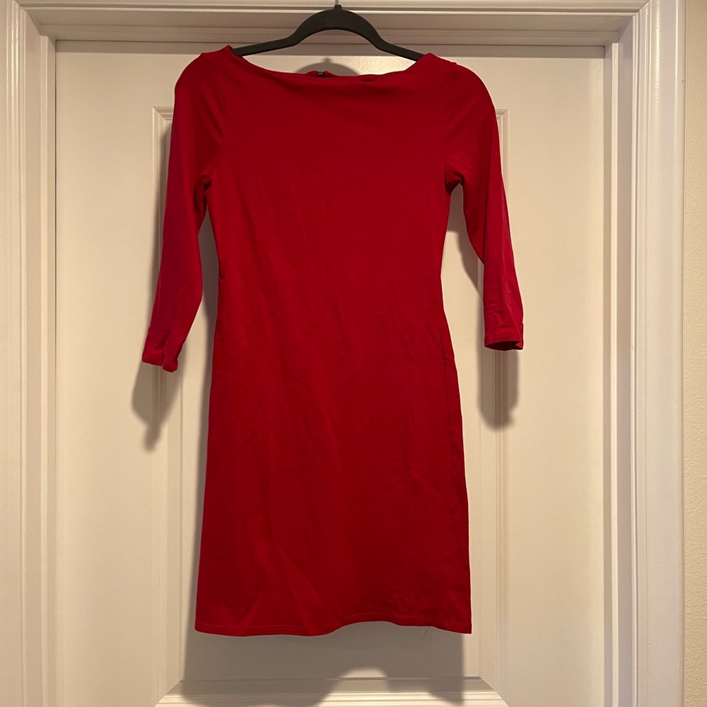 Fitted red mini dress with 3/4 length sleeves